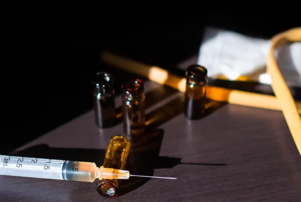 Clinician discussing ketamine-assisted addiction treatment with patient recovering from substance use disorder